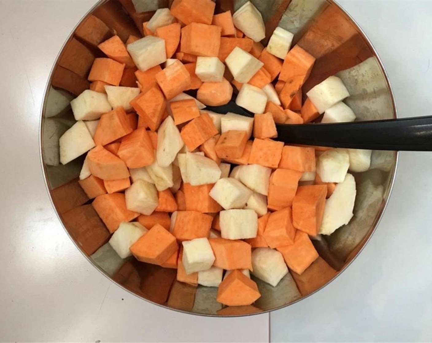 step 1 Peel the Sweet Potatoes (10.5 oz) and White Sweet Potatoes (2 cups) and dice them up finely. Add them to a mixing bowl.