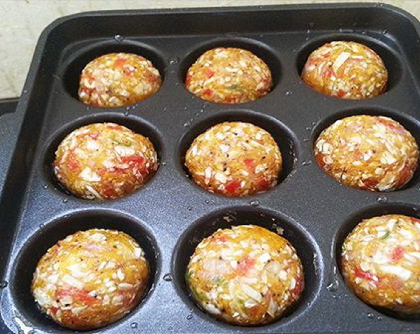 step 3 You can shallow fry or deep fry the Manchurian balls over medium heat until golden brown in color. I am using an appe pan to fry the Manchurian balls. Heat the appe pan and drizzle some Oil (as needed). Reduce the flame to low and place the balls in the pan. Cover and cook on low heat.