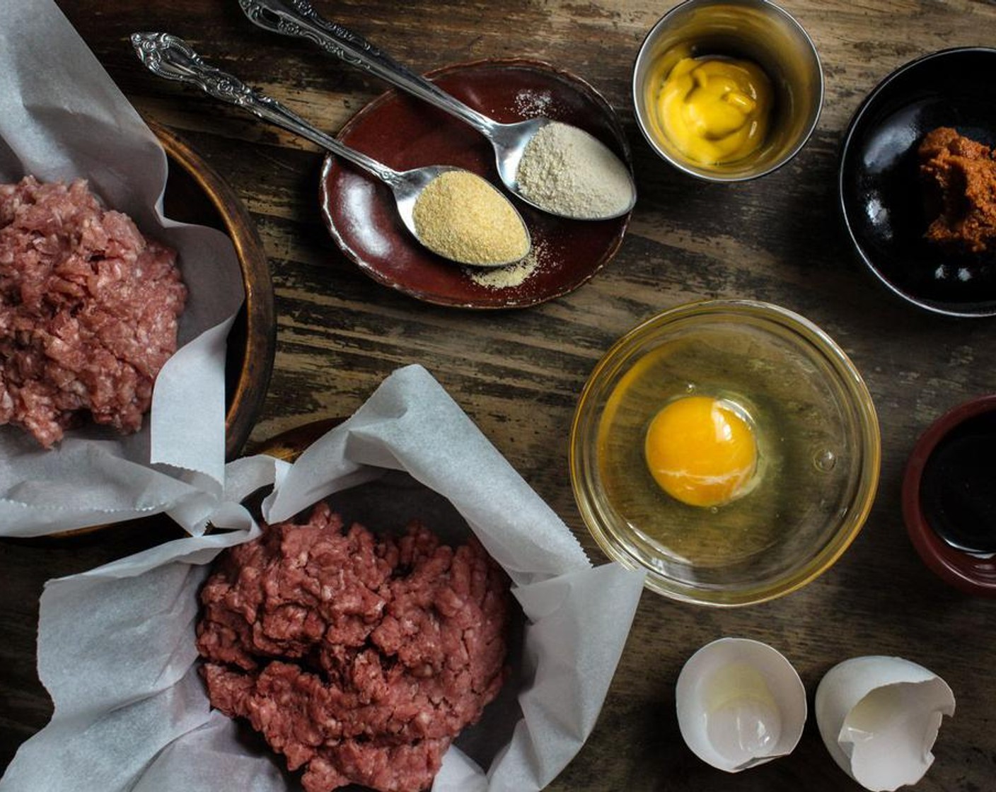 step 1 In a bowl, combine the Ground Beef (9 oz), Ground Pork (9 oz), Yellow Mustard (1 Tbsp), Egg (1), Worcestershire Sauce (1/4 tsp), Miso Paste (1 1/2 Tbsp), McCormick® Garlic Powder (1 tsp), and Onion Powder (1 tsp), and mix.
