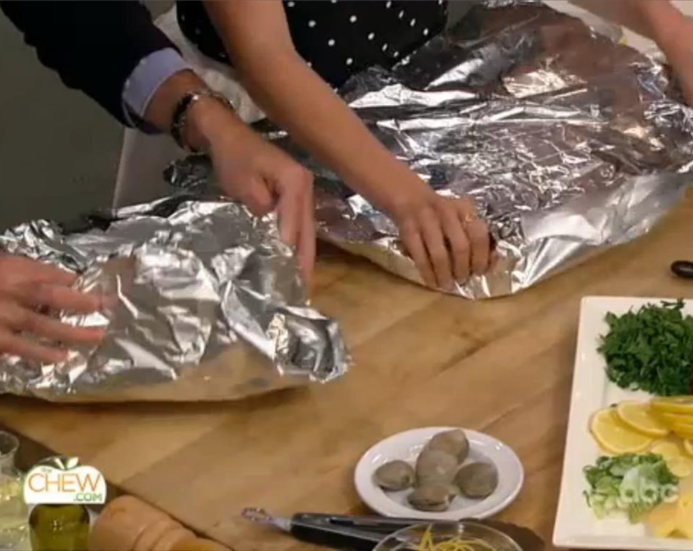 step 3 Lay out 4 large rectangles of heavy-duty foil on a flat surface. Curl up the sides to create a bowl.