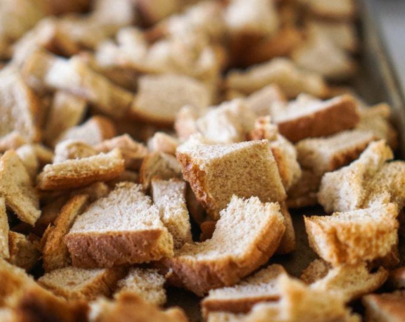 step 2 Halve the stale Whole Wheat Bread (1) cubes ready and set aside in a large bowl.