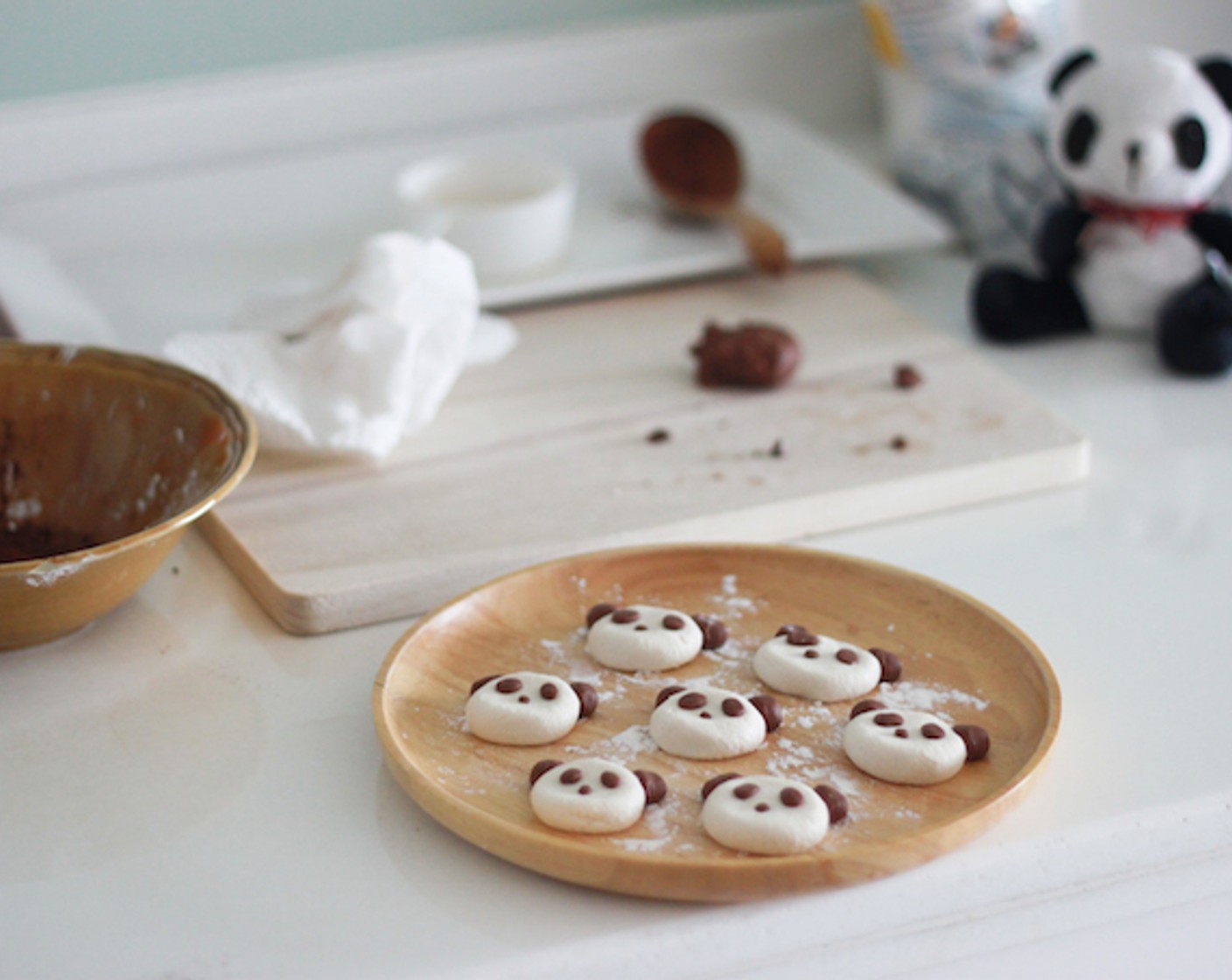 step 8 Make panda faces! Oh this was so much fun. When attaching ears to the face, make sure the dough is sticky enough to stick together, otherwise, they might fall apart when boiling. No one likes earless pandas!