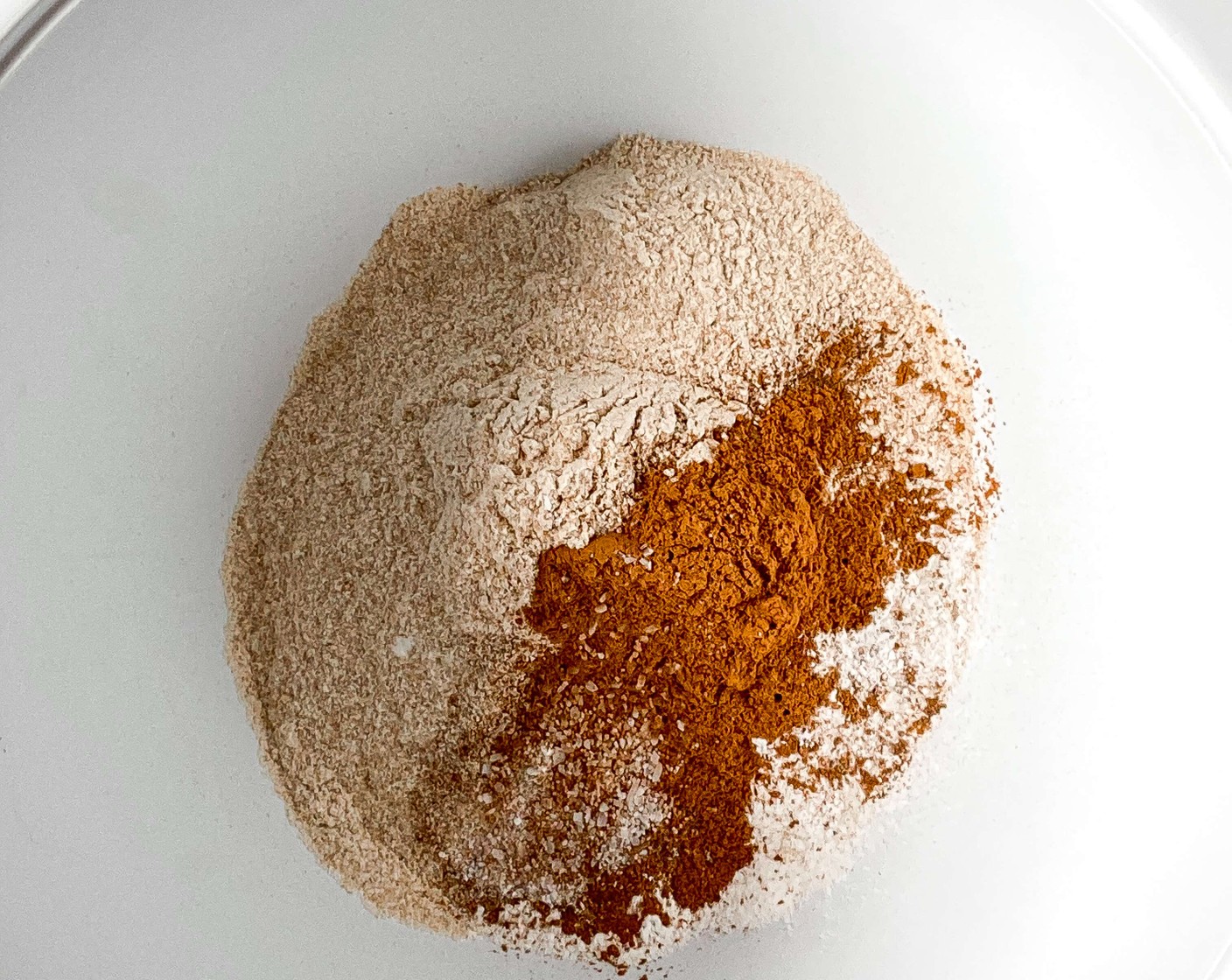 step 2 Combine All-Purpose Flour (1 1/2 cups), Baking Soda (1 tsp), Simply Organic Cinnamon, Ground (1 tsp), Ground Nutmeg (1/2 tsp), and Salt (1/2 tsp) in a large bowl and mix until combined.