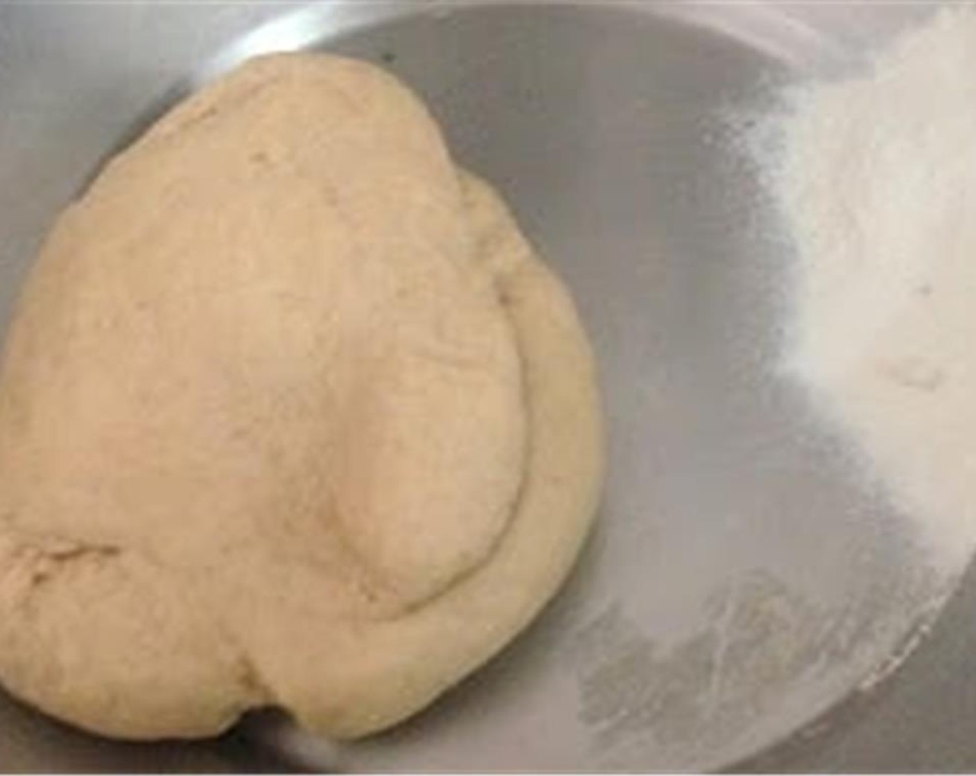 step 4 With the help of Water (to taste) knead it into a not too soft not hard dough.