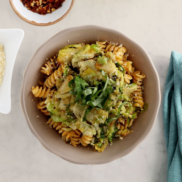 Chickpea Rotini with Shaved Brussels Sprouts, Basil, and Parmesan Cheese Recipe | SideChef