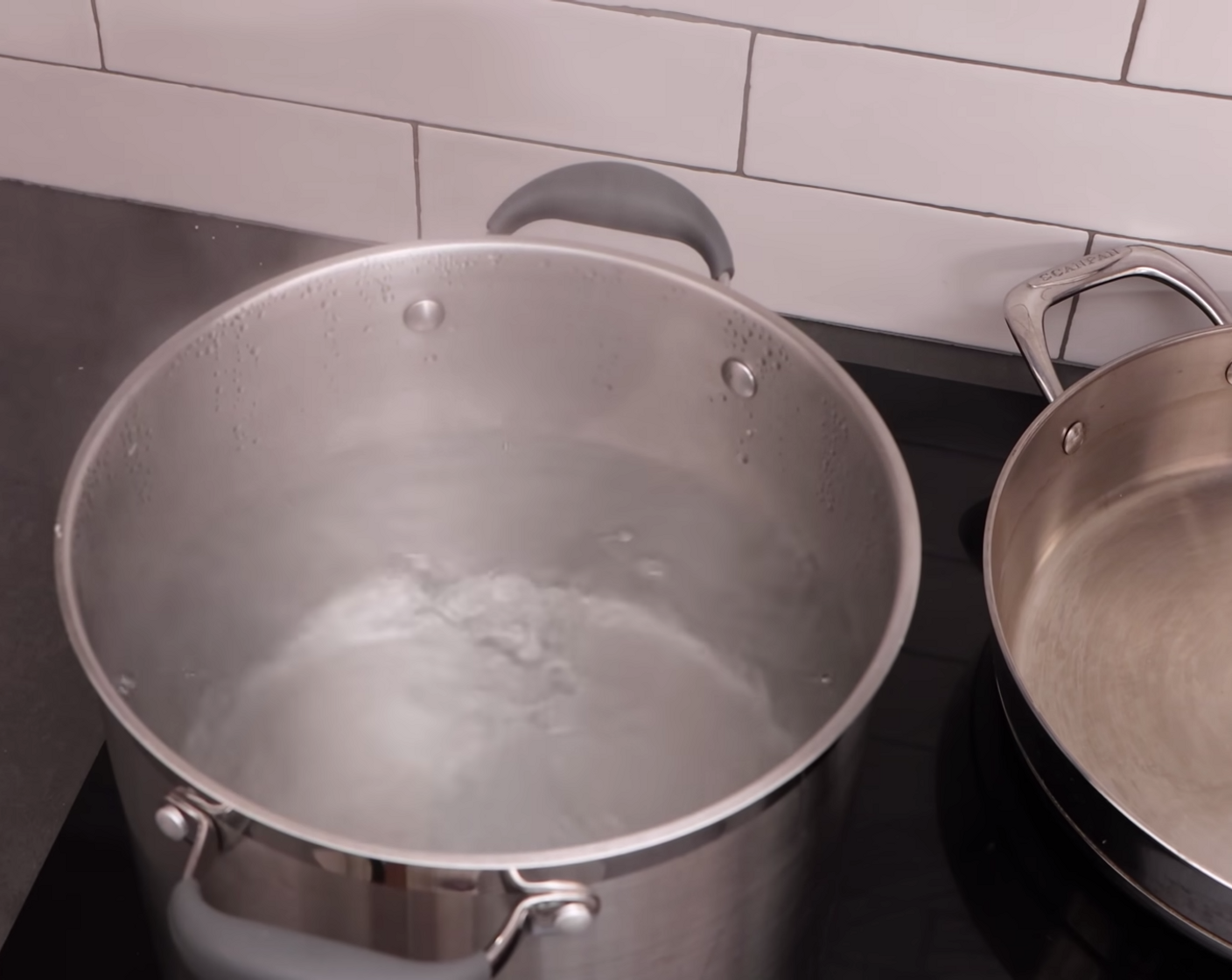 step 1 Get a large pot full of water on the stove and bring it to a boil. Once it boils, add Rock Salt (1 handful) and Pasta (10.5 oz).