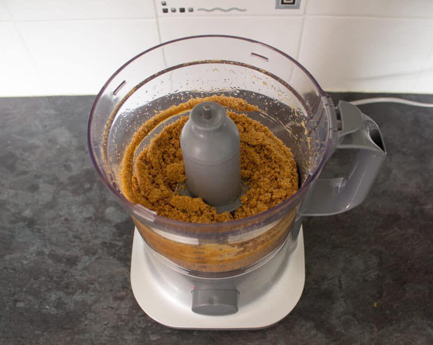 step 2 Pulse the Digestive Biscuits (1 1/2 cups) in a food processor until fine.