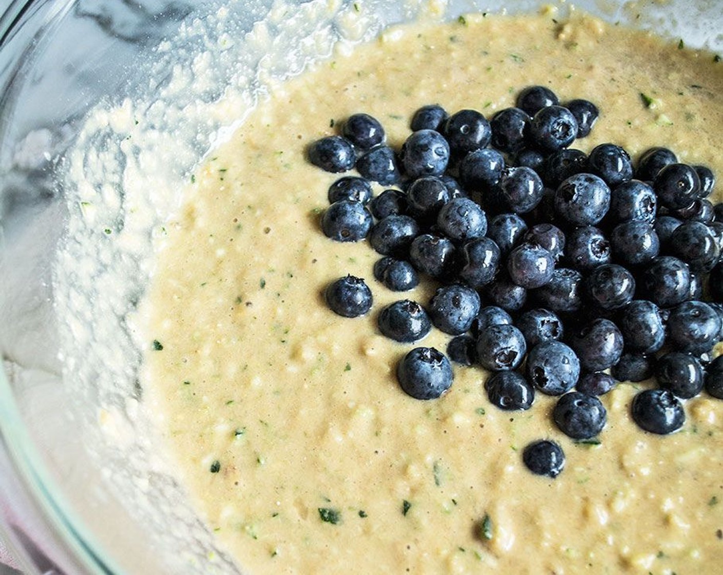 step 4 Gently stir wet ingredients into dry ingredients, and mix until just combined. Fold in Fresh Blueberry (1 cup) then evenly divide among 12 lined muffin wells.