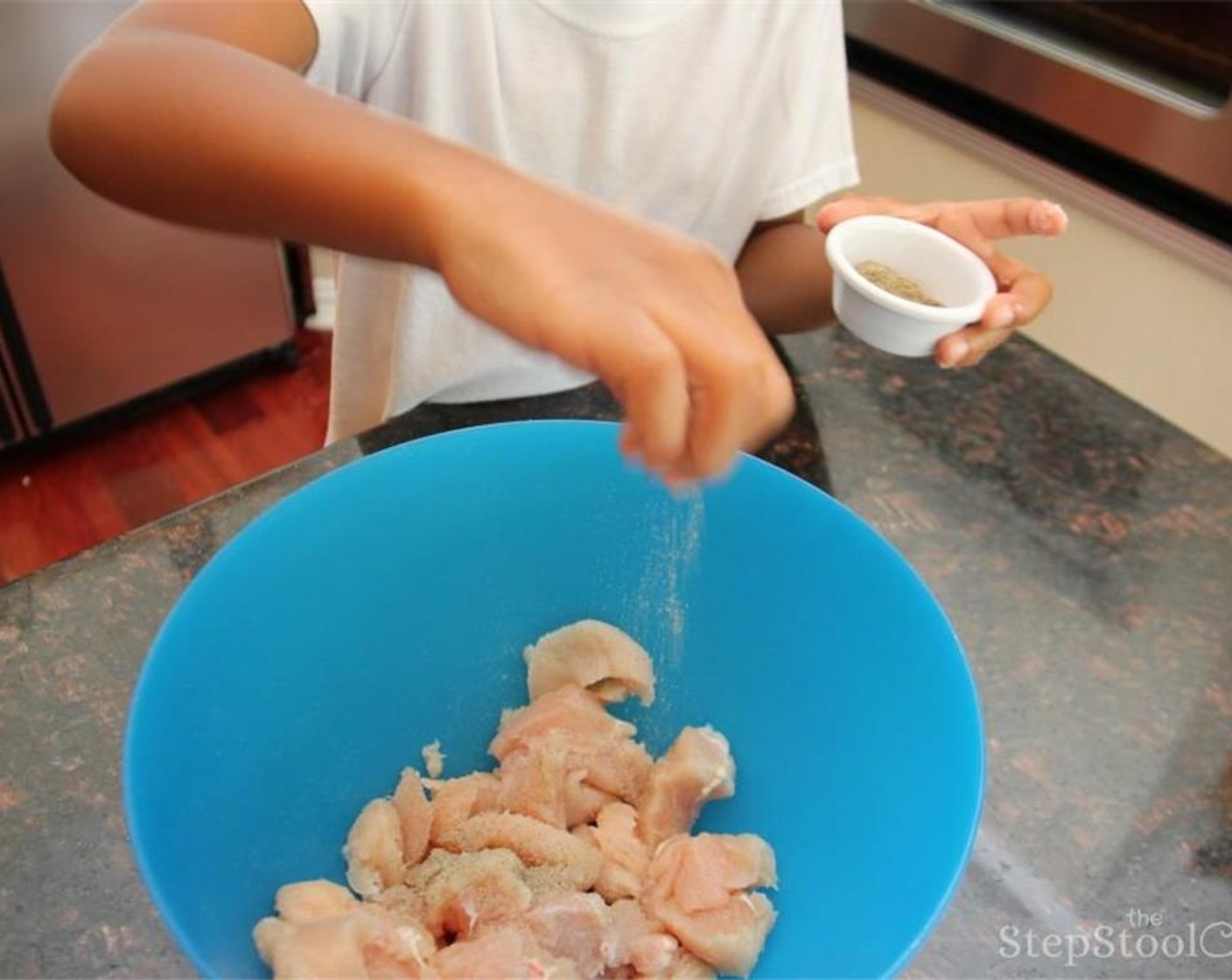 step 4 Transfer the cubed chicken to a large mixing bowl. Season with Salt (to taste) and Ground Black Pepper (to taste).