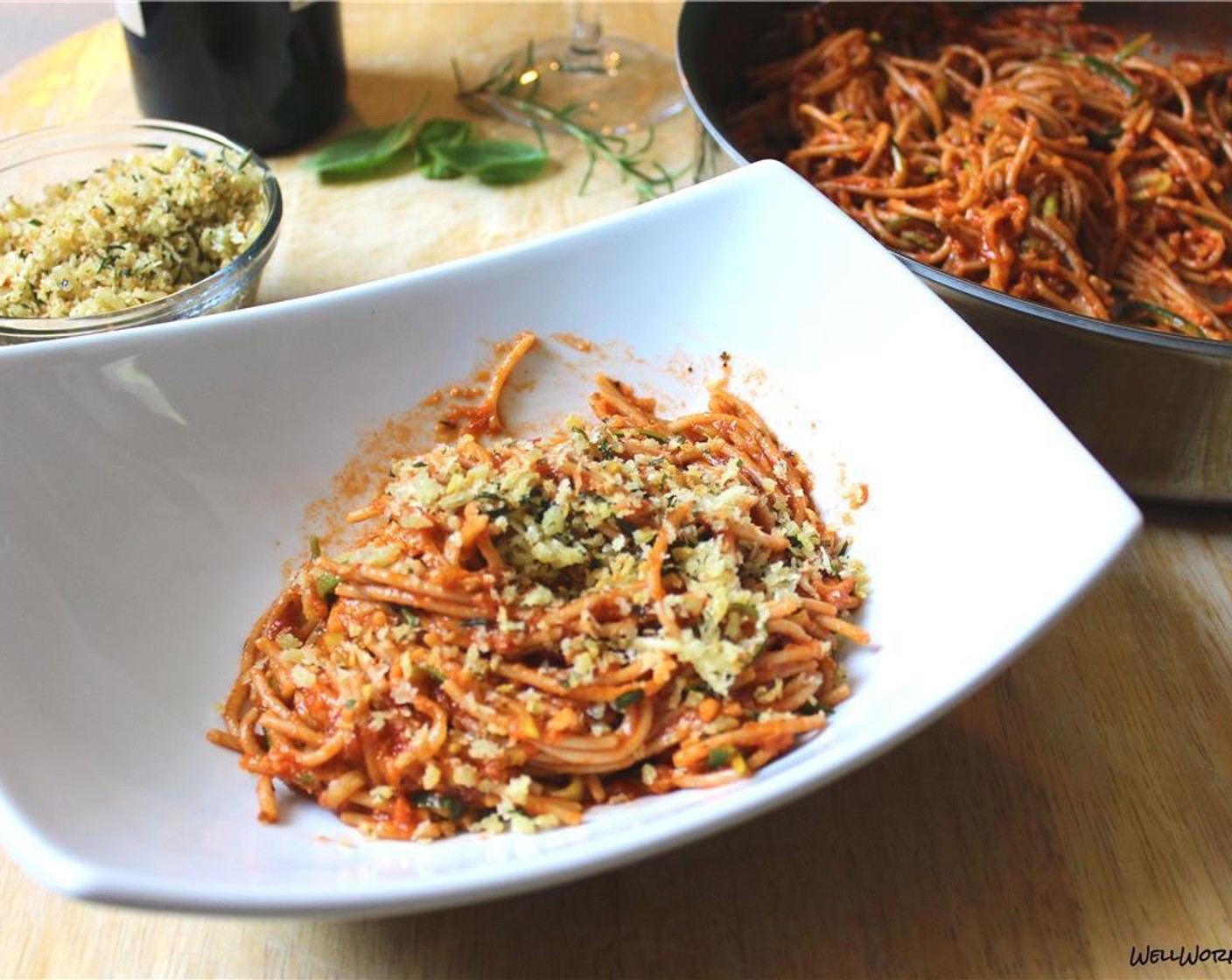 step 6 Put a healthy portion of spaghetti in each bowl and top with breadcrumbs.
