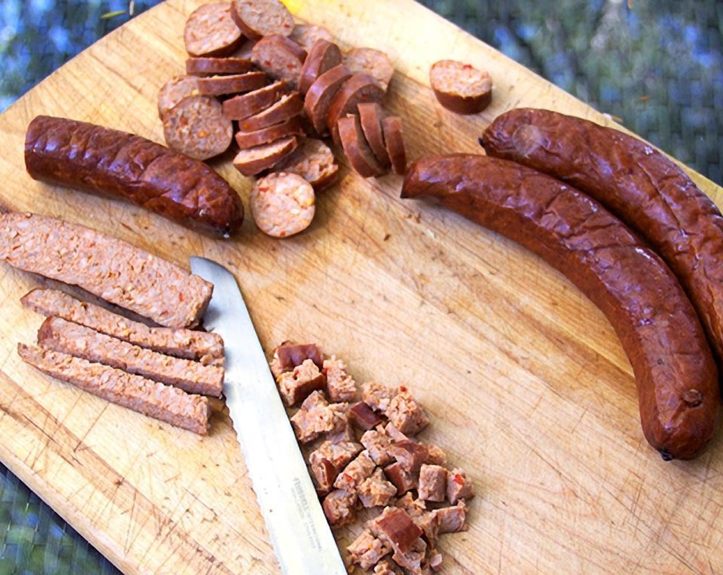 step 1 Slice 1/4 of the Linguiça Sausages (1.5 lb) thin rounds – the rest into a quarter inch dice.