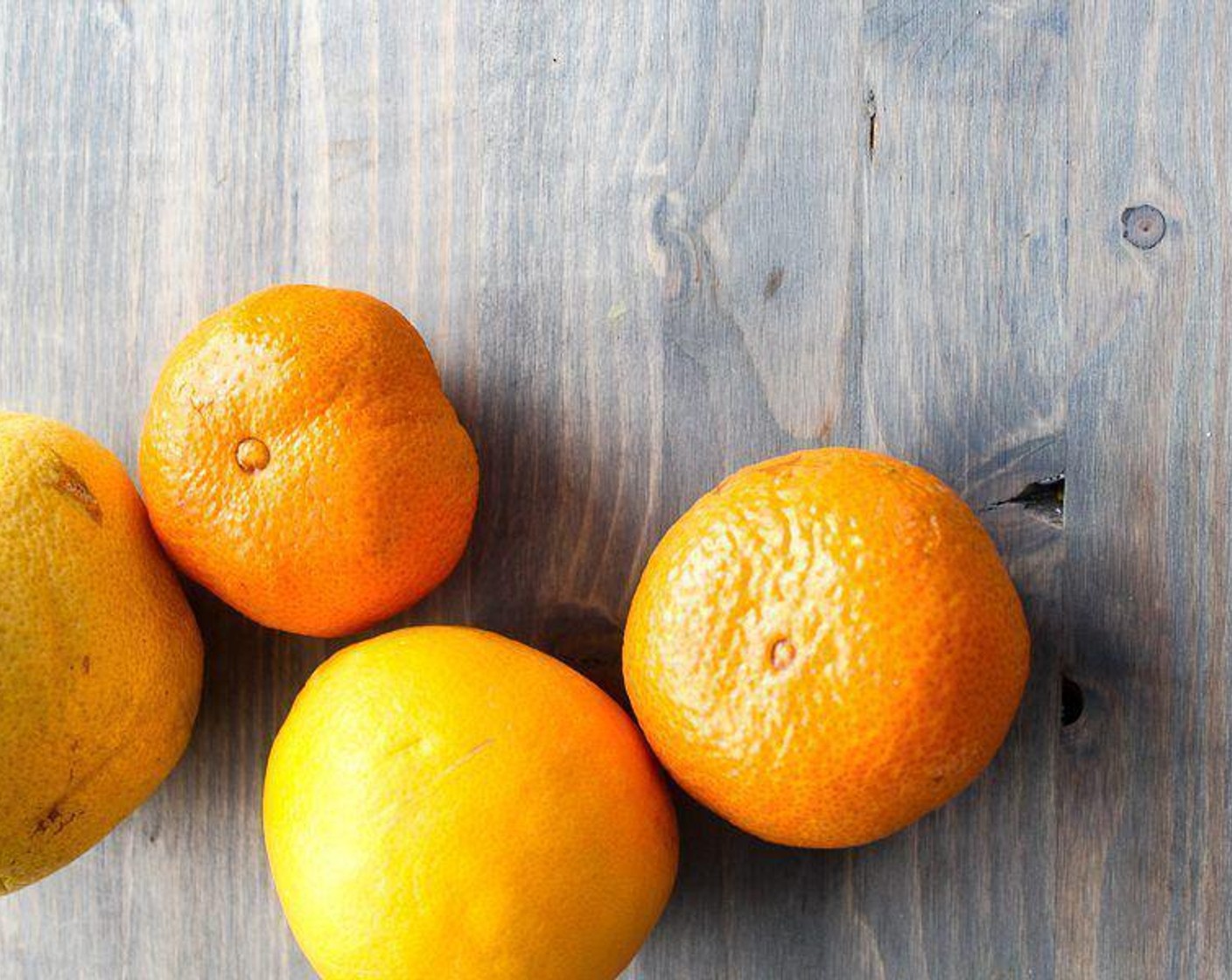 step 1 Carefully cut the peel and pith away from the Grapefruit (1) and Oranges (2). With a small paring knife, cut the fruit sections out and place in a bowl.