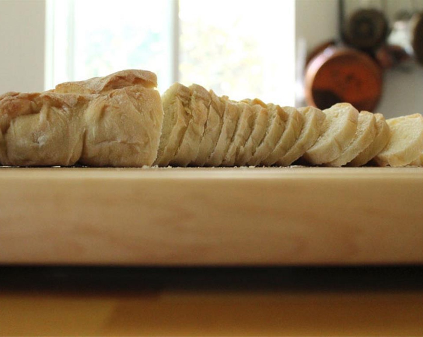 step 2 Drizzle Baguettes (16 slices) with a bit of Olive Oil (1 tsp), sprinkle with Salt (to taste). Toast for about 10 to 15 minutes, or until crispy and slightly browned.