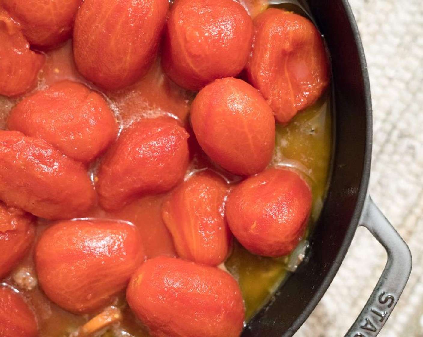 step 4 Add the Bell Pepper (1). Tomatoes (2 cans) and Tomato Paste (1 can). You can drain the whole tomatoes if you like, but you can just cook down the sauce if want it to be thicker. If you're using whole tomatoes, break them up a bit with the spoon.