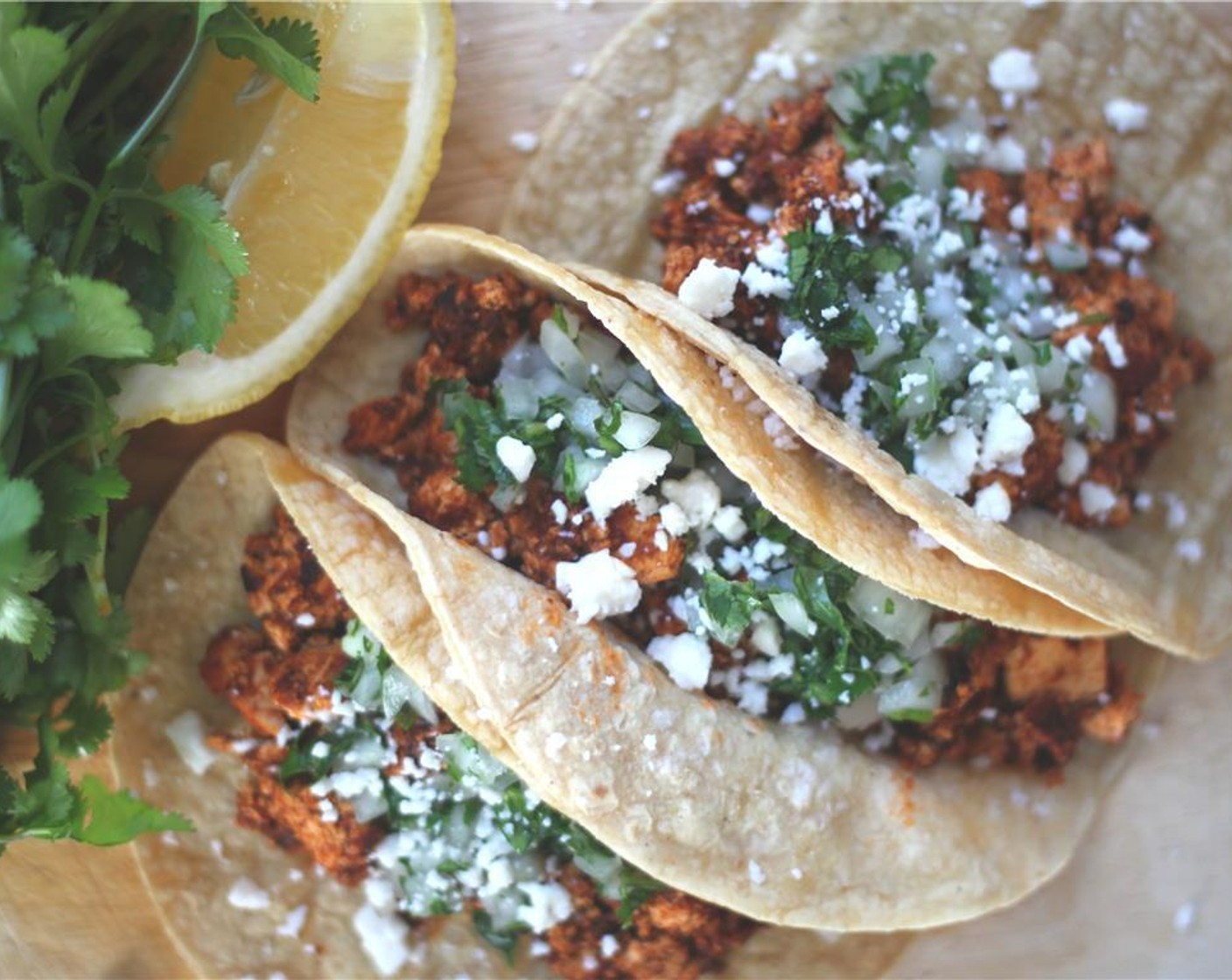 step 8 When the tofu is done to your liking you are ready to assemble and enjoy.  If you aren't keeping these vegan, add some crumbled Queso Fresco (to taste) to help cut a little bit of the heat.