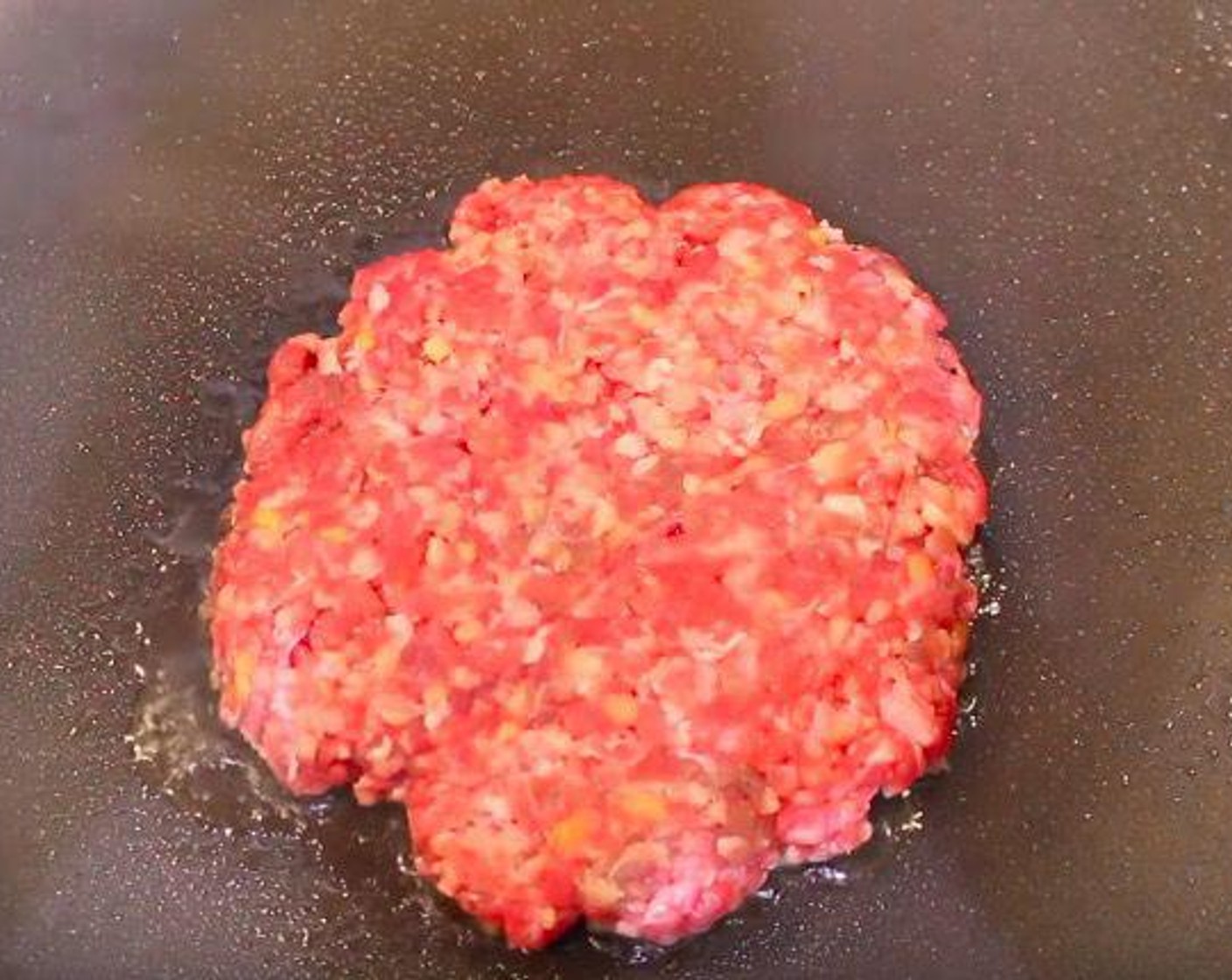 step 2 In a large pan over high heat, spray Canola Oil Spray (as needed). Cook the patties for 2 minutes.