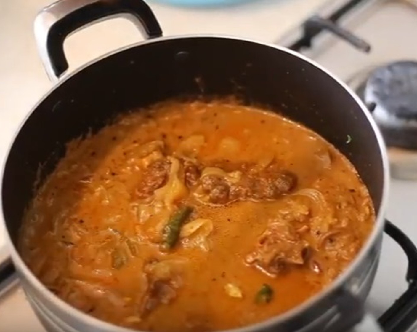 step 8 Add the cooked oxtail from the cooker. Taste and allow to simmer