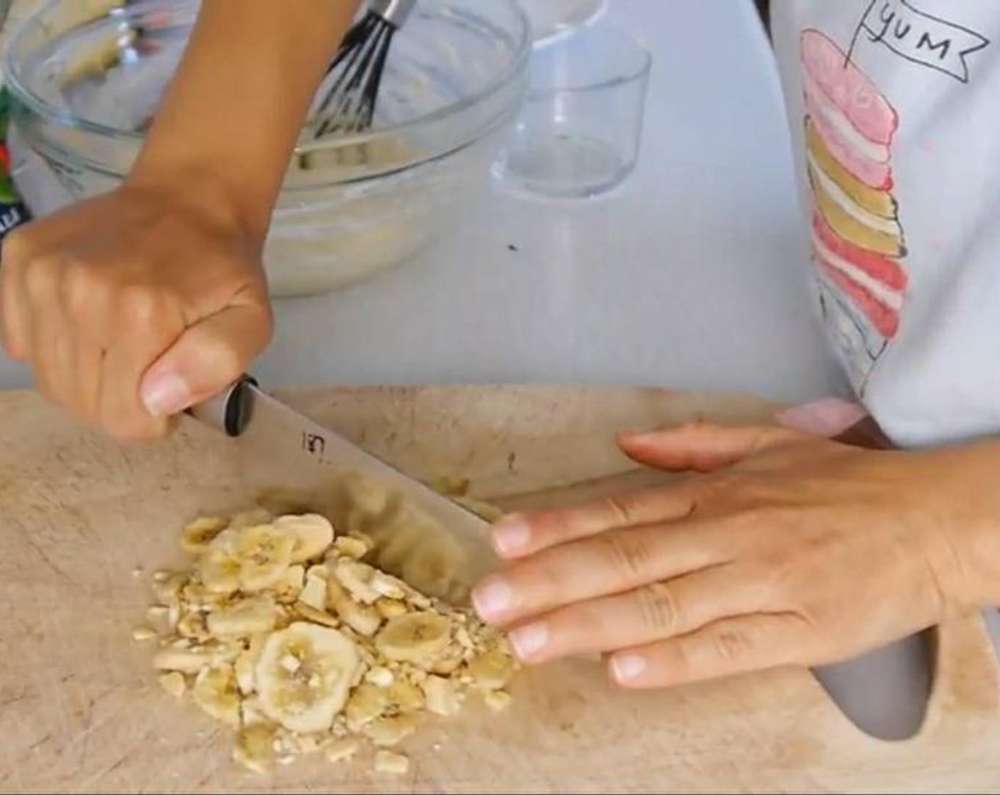 step 3 In a board chop the Banana (1/3 cup) crisps trying to avoid flying off the board (like it did to me) and set aside. Chewy banana chips are also good.