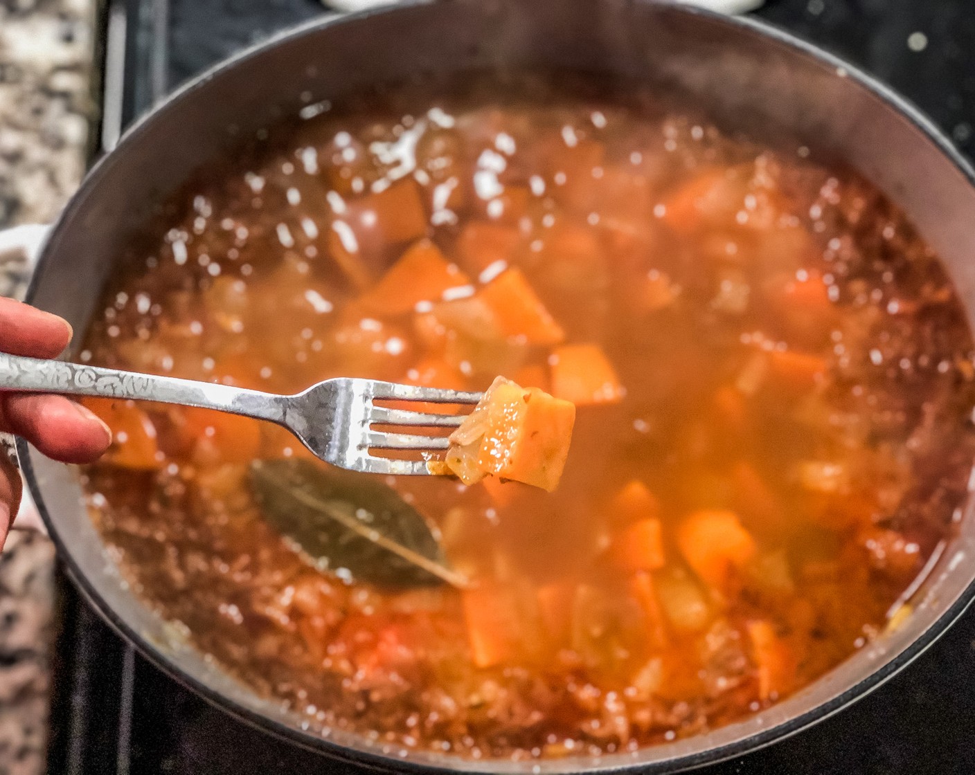 step 5 After 20 minutes, use a fork to check sweet potatoes for tenderness.