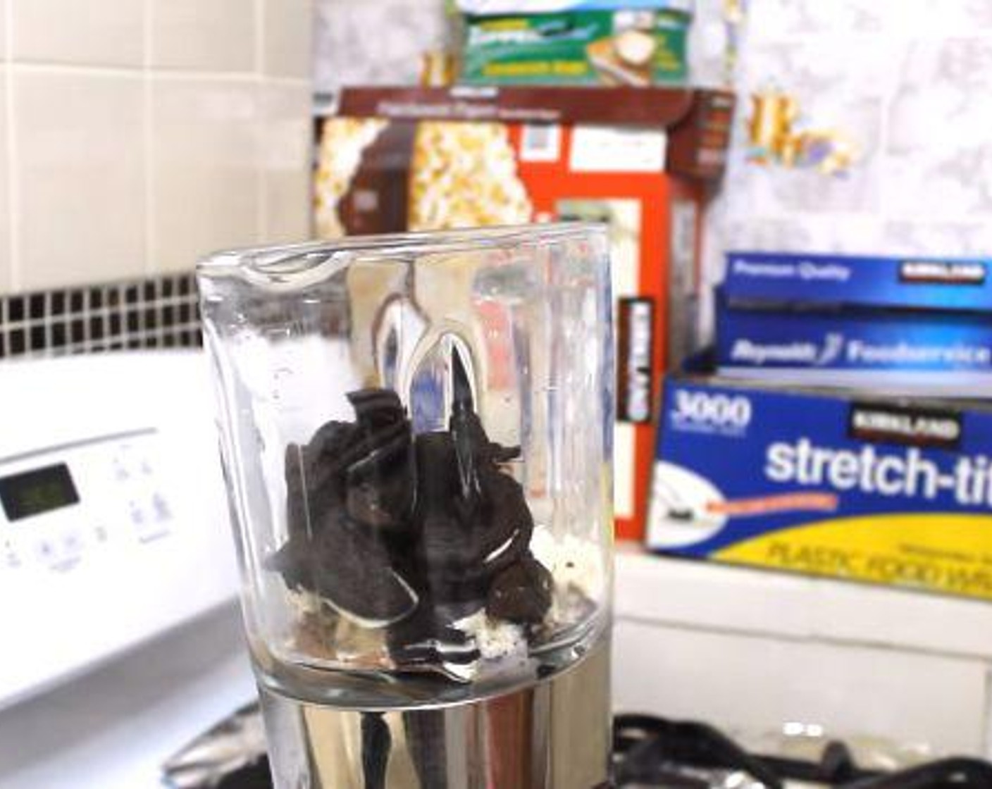 step 1 Put the Vanilla Ice Cream (4 scoops) and Chocolate Ice Cream (2 scoops) into the blender. Break up the Oreo® Chocolate Sandwich Cookies (10) and add them and the Milk (1/2 cup) to the blender as well.