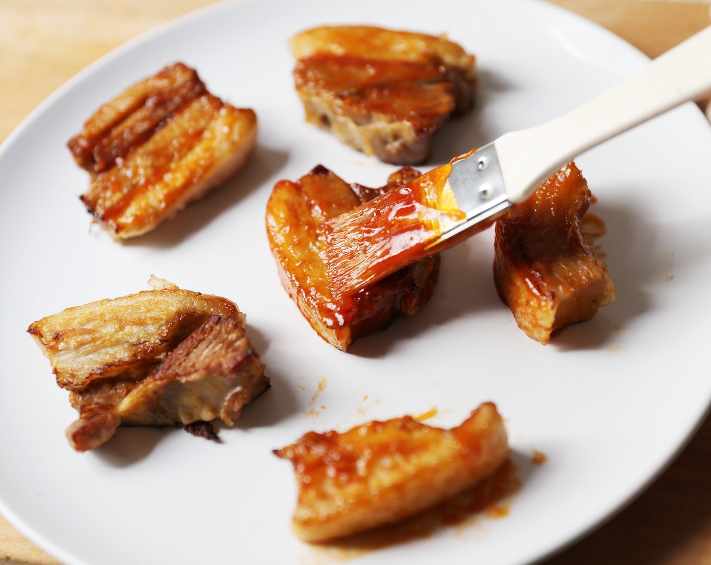 step 10 Coat the braised bacon pieces in the Gochujang sauce mixture.