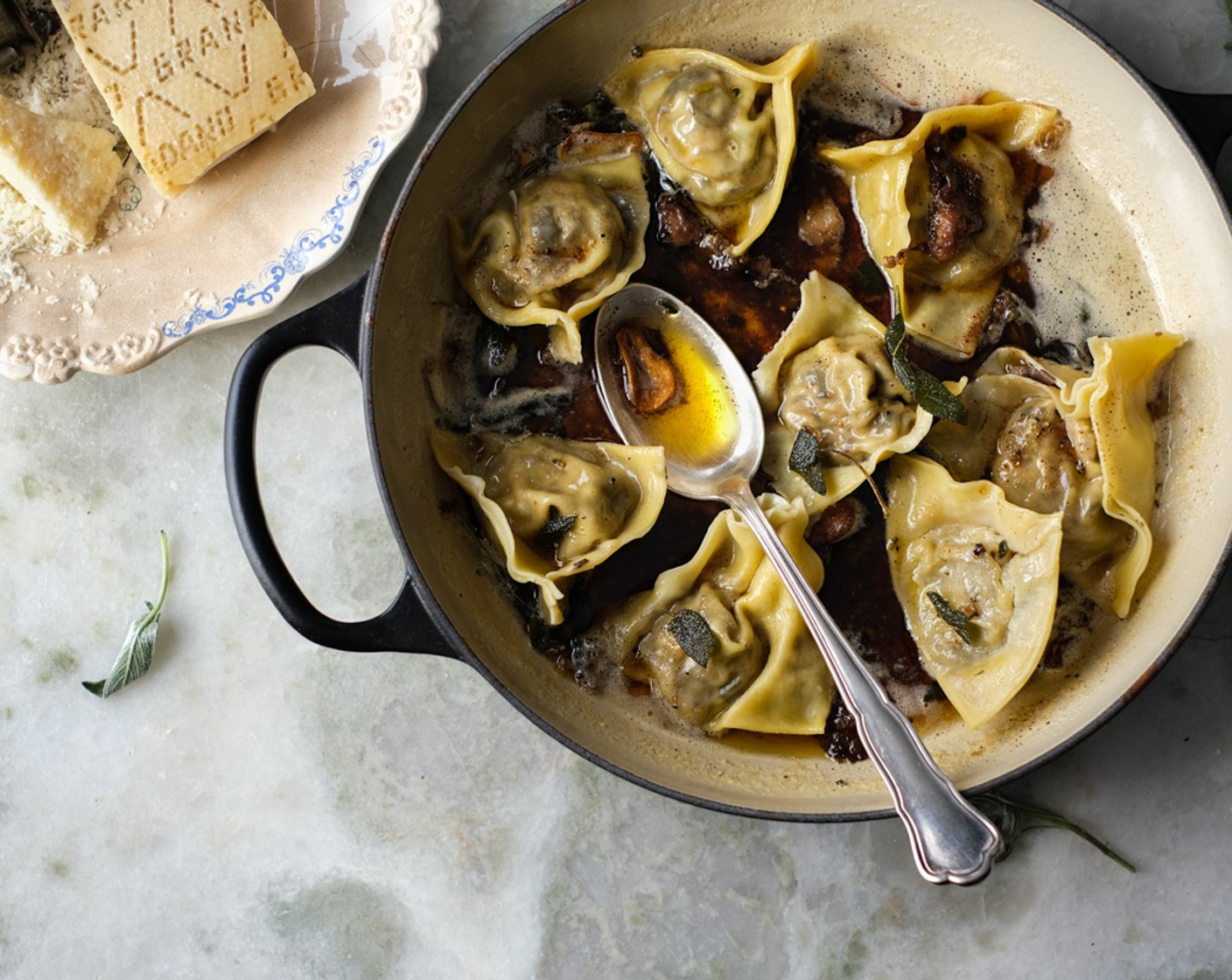 step 20 Plate the pasta in warmed bowls, spoon over the bone marrow butter and serve with Parmesan Cheese (to taste).