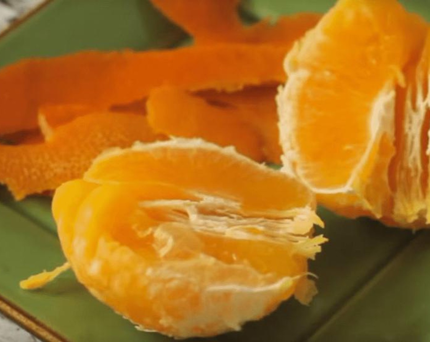 step 1 To make the simple syrup, first chop the Fresh Ginger (1 tsp). Peel 5 twists of tangerines from the Tangerine (1) then cut it into 4 wedges.