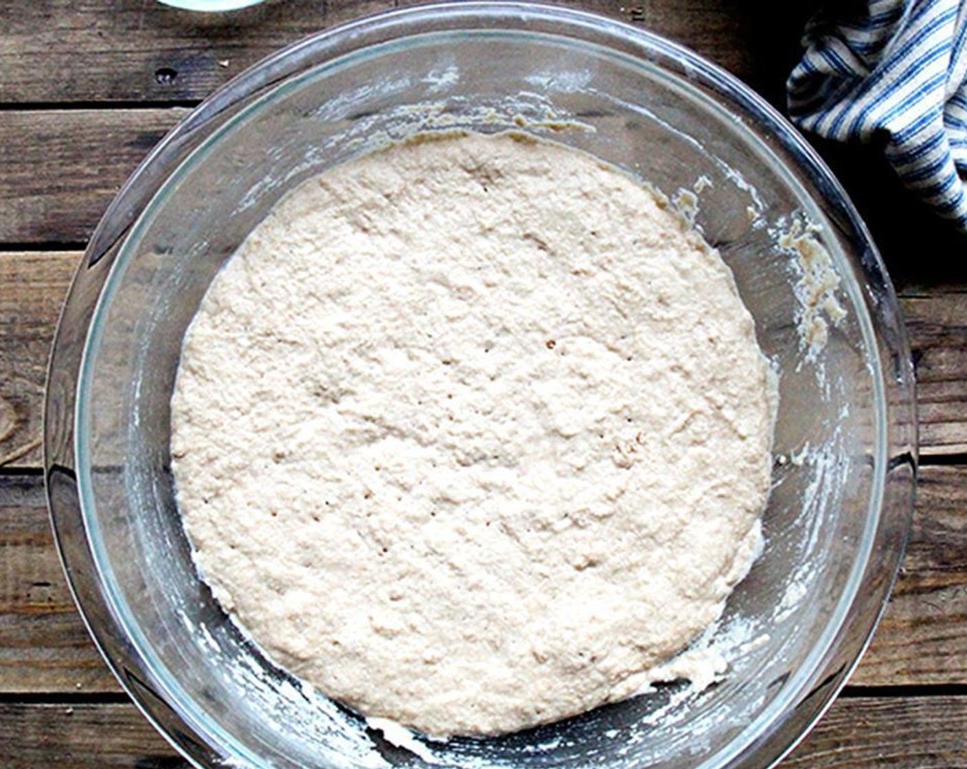 step 1 Whisk together White Whole Wheat Flour (2 2/3 cups), Kosher Salt (1 1/4 tsp) and Instant Dry Yeast (1/2 Tbsp). Add lukewarm Milk (1 1/2 cups), Honey (1 Tbsp) and Oil (1 Tbsp). Stir until combined. Cover bowl with tea towel or plastic wrap. Refrigerate overnight.