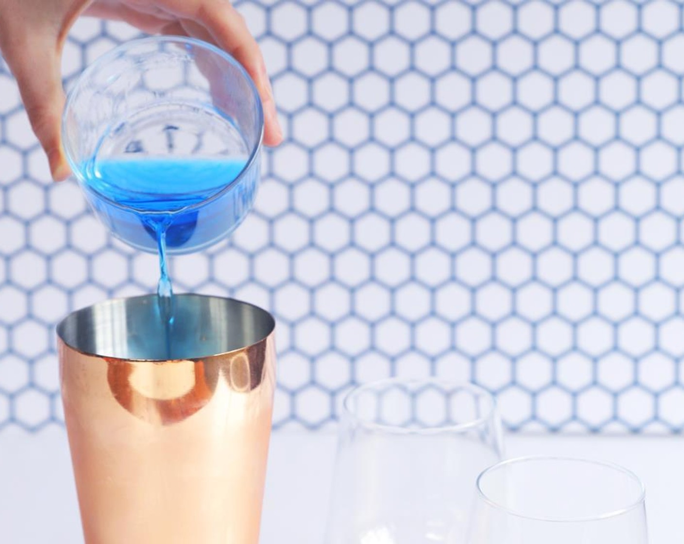 step 1 Fill cocktail mixer with Ice (to taste) and add Blue Curaçao (3 Tbsp), White Rum (3 Tbsp), Coconut Milk (3 Tbsp), and Pineapple Juice (90 mL).