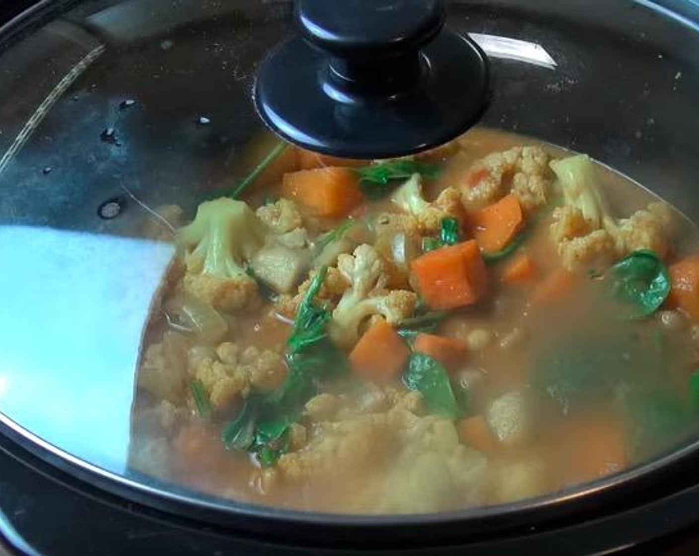 step 5 Stir in Coconut Milk (1/2 cup) and Fresh Baby Spinach (1 2/3 cups). Cover and allow to stand for 15 minutes.