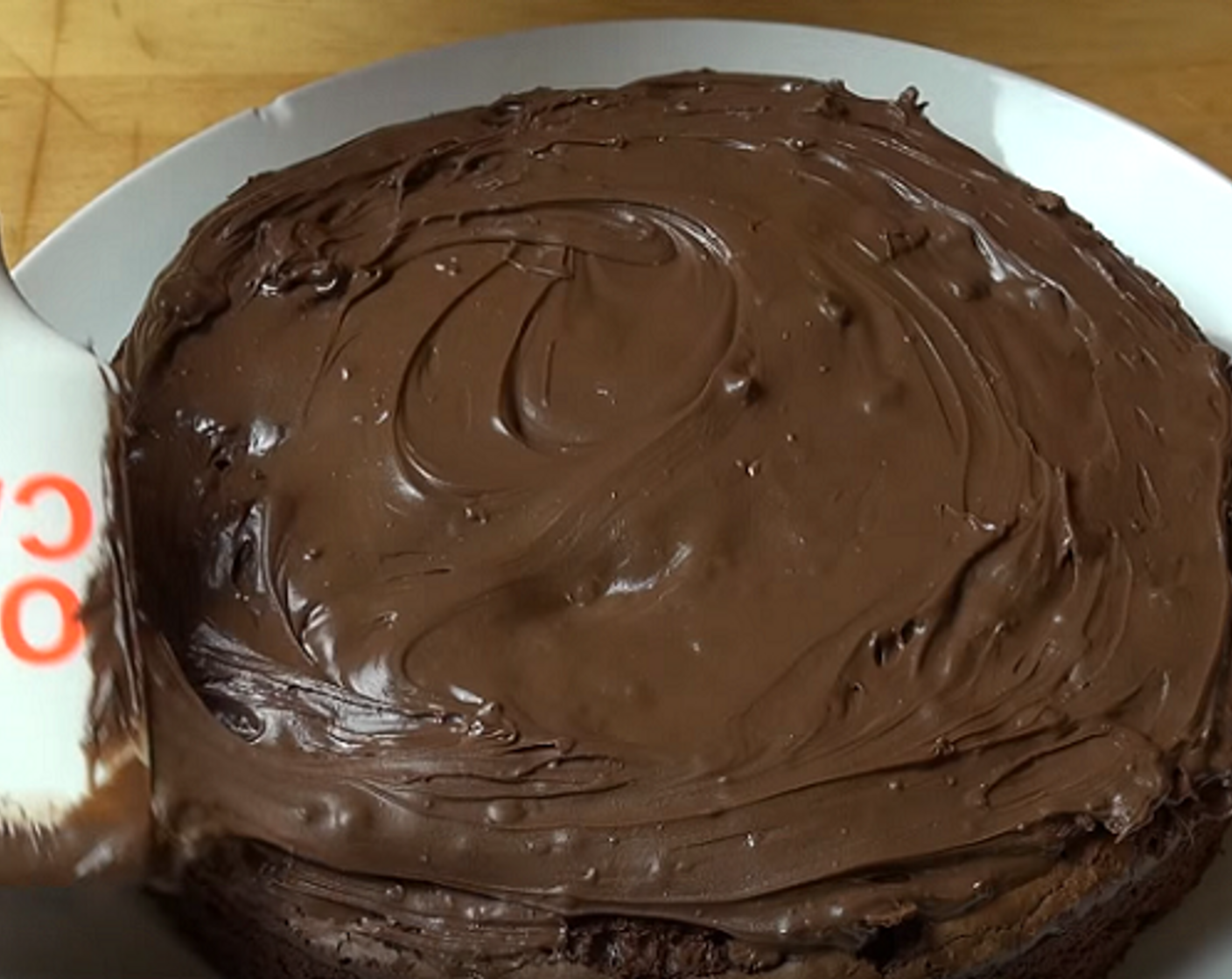 step 3 Let the cake sit in the tin for 10 minutes, then turn out onto a wire rack to cool completely. if you want to be extra decadent, ice the top of the cake with Nutella® (to taste), or else sprinkle with some icing sugar.