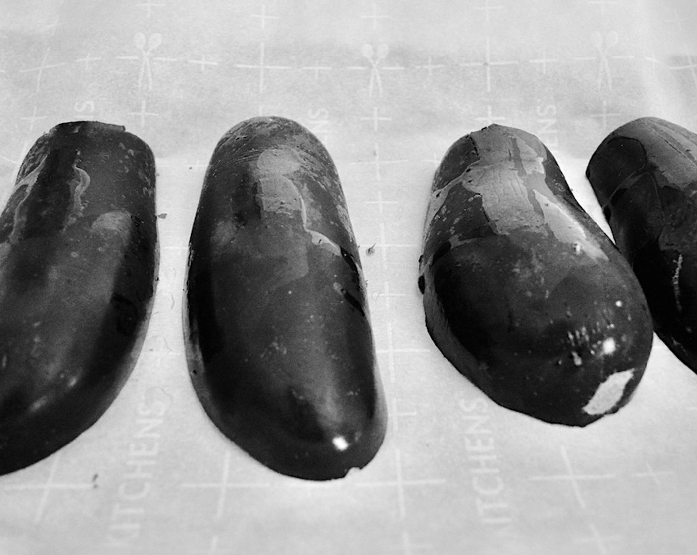 step 3 Sprinkle the cut sides of the eggplant with Salt (to taste) generously, then line them upside down on the sheet tray.