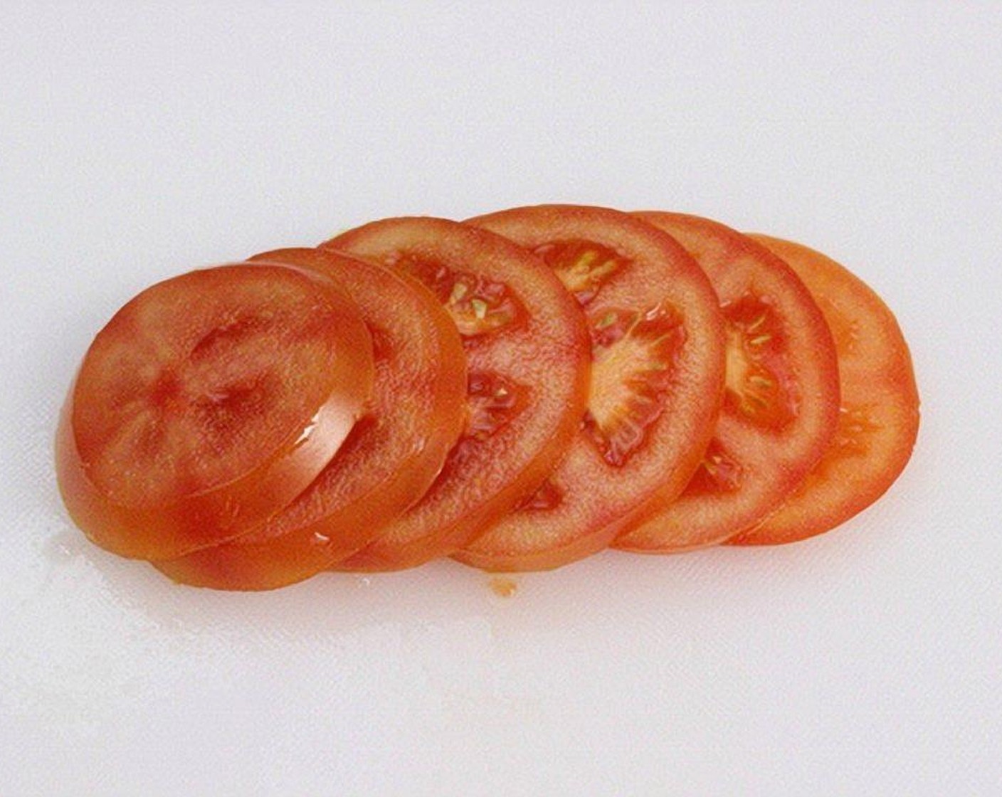 step 6 Cut the Tomatoes (2) into slices.