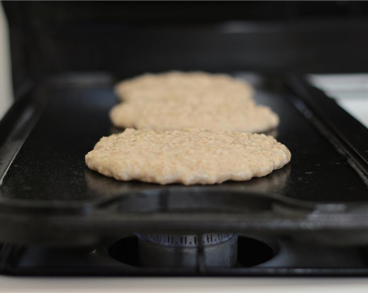 step 6 For each pancake, pour about 1/4 cup of batter onto the griddle. Cook until golden brown on both sides, turning only once.