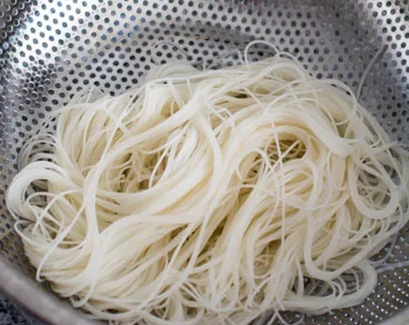 step 3 Drain the noodles then pat them dry with a paper towel.