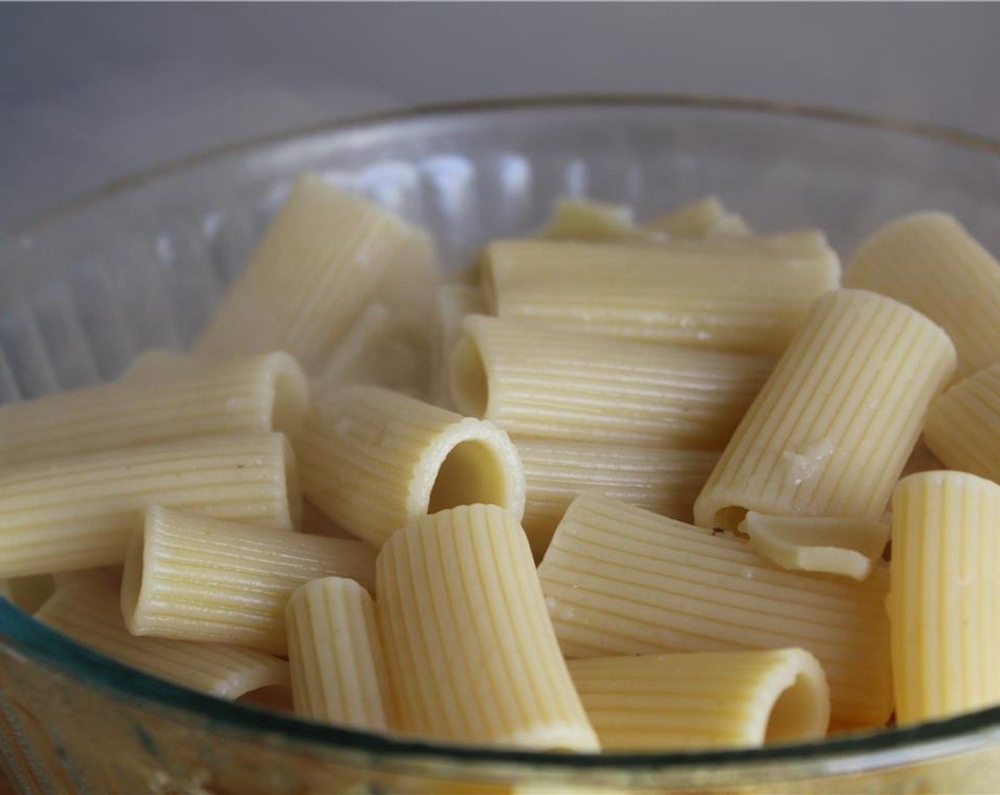 step 4 Prepare Large Rigatoni (1 lb) according to package instructions, but undercook it by a couple of minutes so it is a bit shy of “al dente” (the noodles will soften more when they cook in the oven). Drain and set aside.