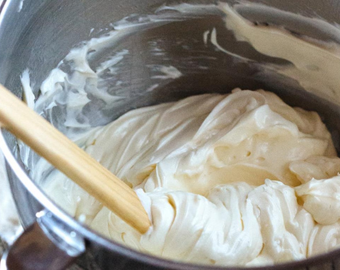 step 10 Slowly add Heavy Cream (3/4 cup), Powdered Confectioners Sugar (1/4 cup) and Vanilla Extract (1 tsp) in the bowl and whip the mixture until it turns light and fluffy.
