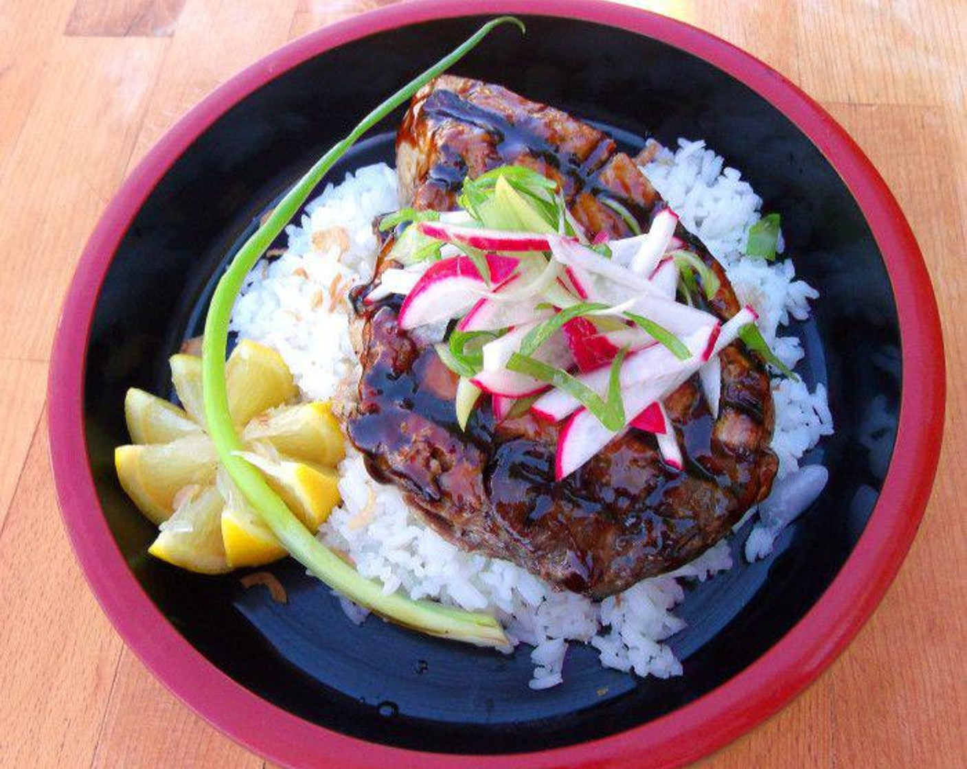 step 4 Place the tuna on top of the rice and top the tuna with Scallions (to taste) and Radishes (to taste). Serve and enjoy!