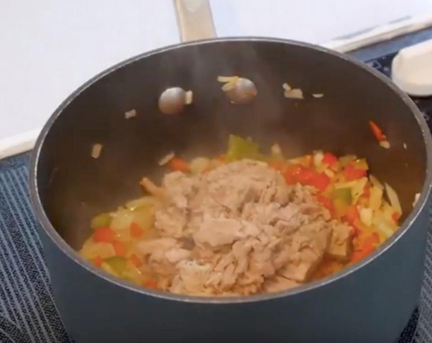 step 2 When the vegetables are soft, add the Canned Tuna (1 cup) and leave to cook for 10 to 15 minutes and leave to cool.