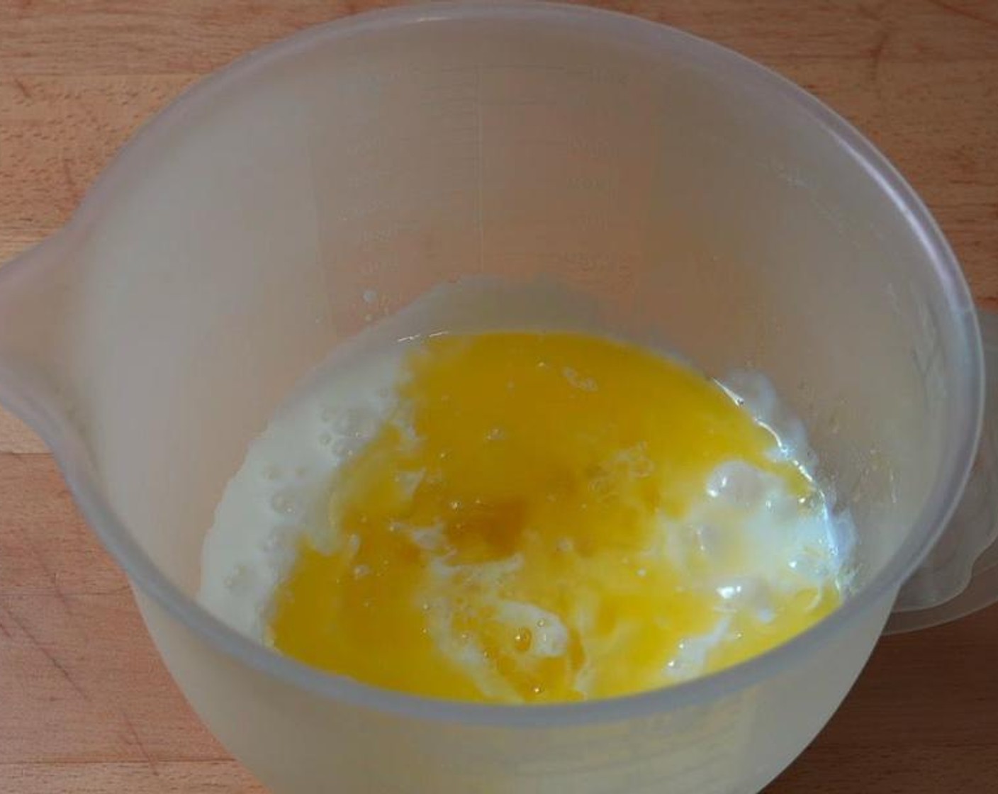 step 2 In a mixing jug, add Buttermilk (1 cup), Butter (3 oz), and Eggland's Best Classic Egg (1). Whisk to combine.