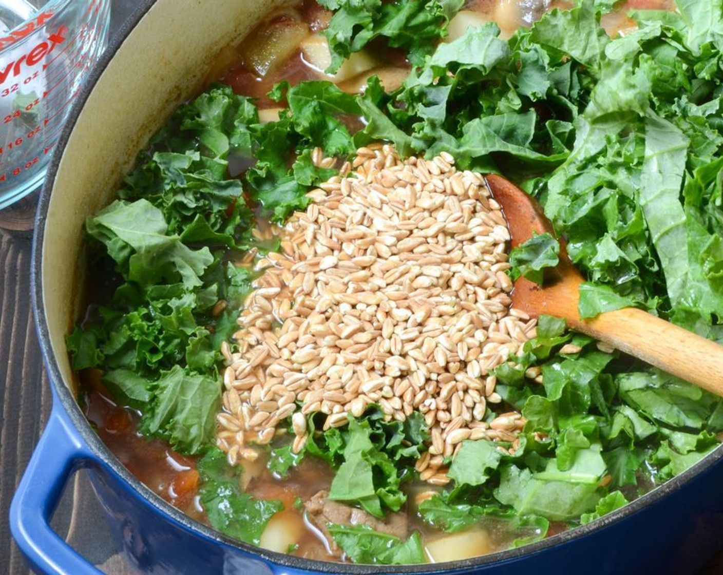 step 7 Stir in the Kale (4 cups) and Farro (1/2 cup) and simmer for 10 to 15 minutes more. Season to taste with additional salt and pepper.