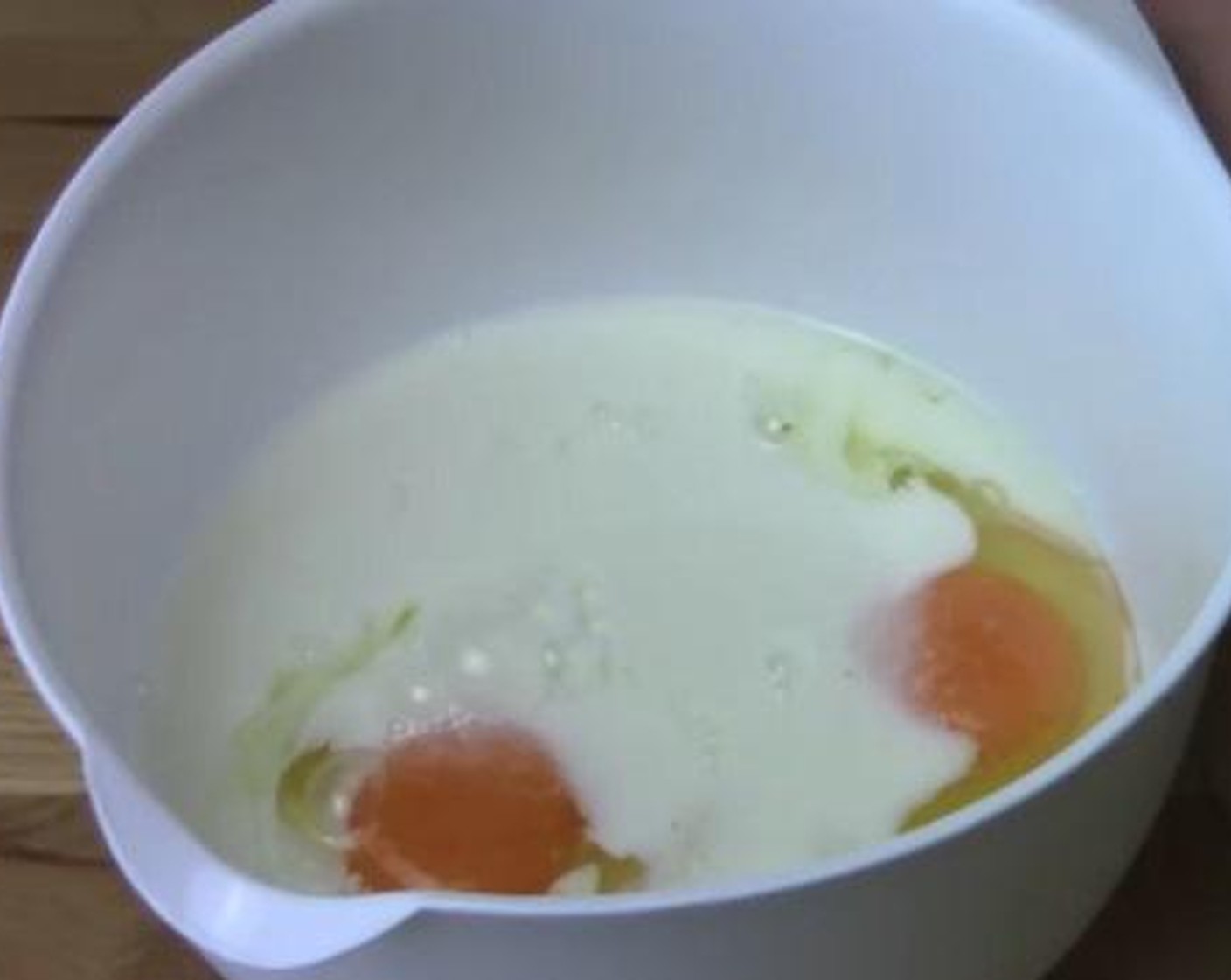step 3 In a separate bowl, add and mix the Eggs (2), Granulated Sugar (1/4 cup), and Milk (3/4 cup).