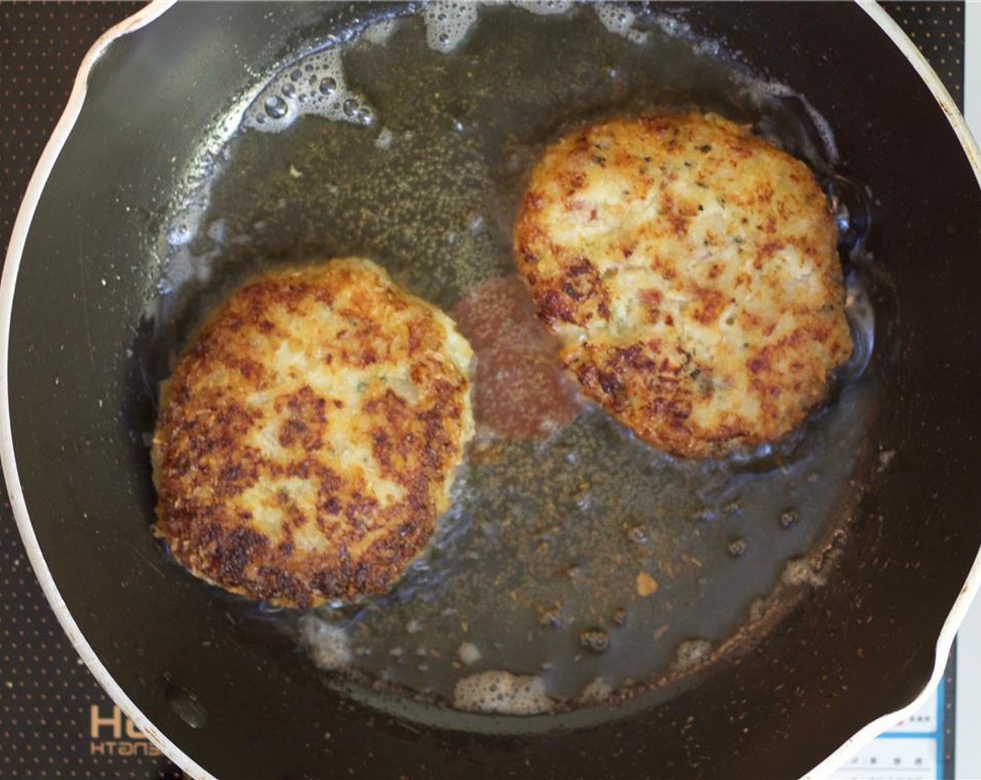 step 10 Heat a quarter-inch of Vegetable Oil (as needed) in a skillet over medium heat. Working in batches, cook croquettes in a single layer until golden brown, about 2 minutes per side. Transfer to paper towels to drain.