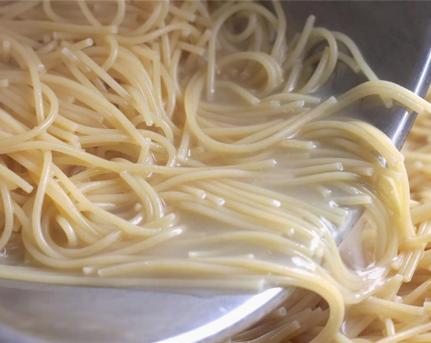 step 6 Boil spaghetti until slightly underdone (a minute or two under package directions). Drain and rinse with cold water to stop the spaghetti from cooking any more. Set aside.