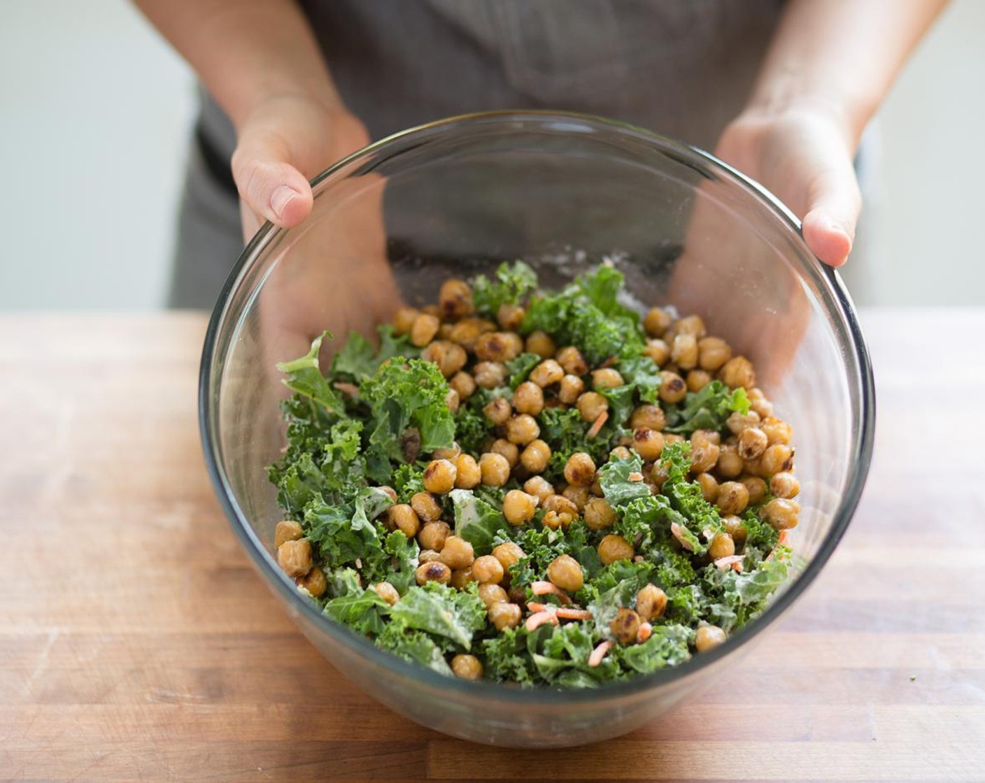 step 7 Add the Kale (3 1/3 cups), Carrot (1/4 cup), Dried Cherry (1/4 cup) and chickpeas to the bowl with the tahini dressing. Toss gently to combine.