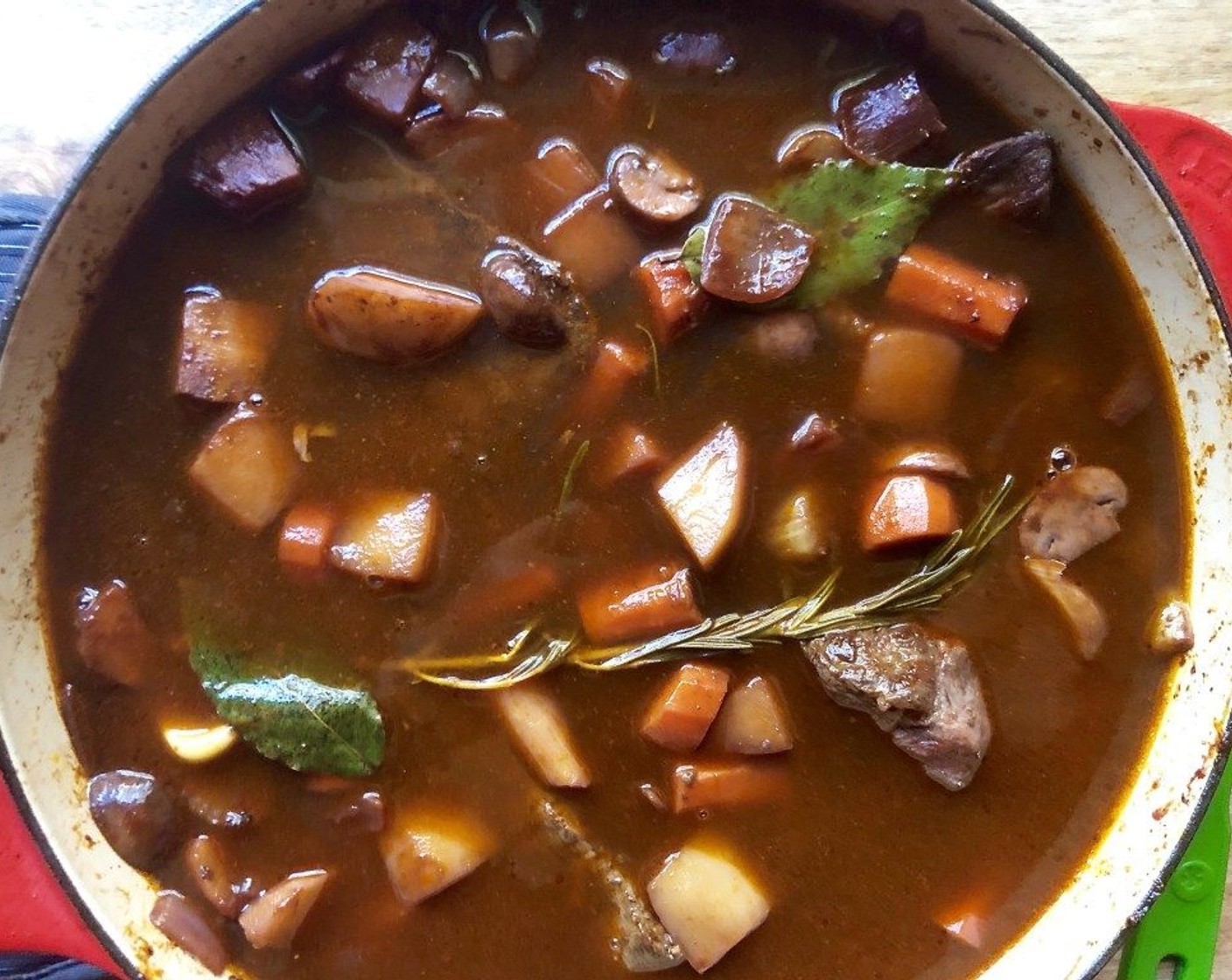 step 8 Return the beef and any accumulated juices to the pot. Add the stock or broth. Bring to a boil. Cover and transfer to the preheated oven. Braise until the beef is very tender, about 2 hours and 45 minutes.