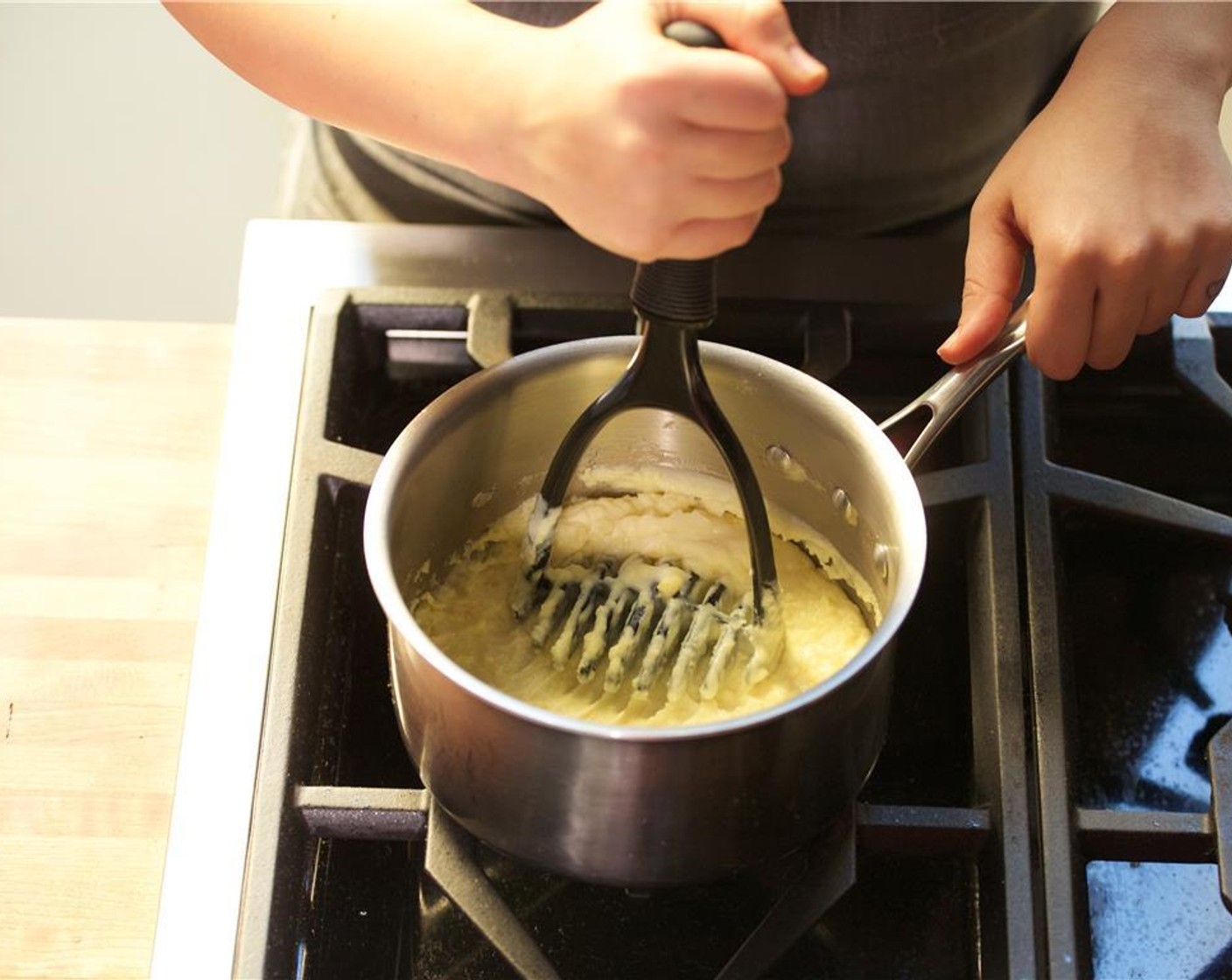 step 18 Finish the potatoes by adding remaining Butter (2 Tbsp), Heavy Cream (1/2 cup), and Salt (1 tsp). Mash to desired consistency, but do not overmix or the potatoes will become too starchy.