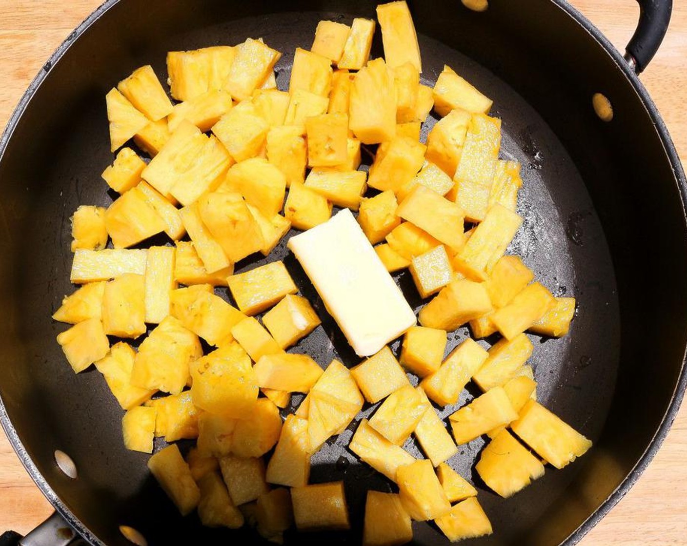 step 5 Saute the diced pineapple with Butter (1/2 stick).