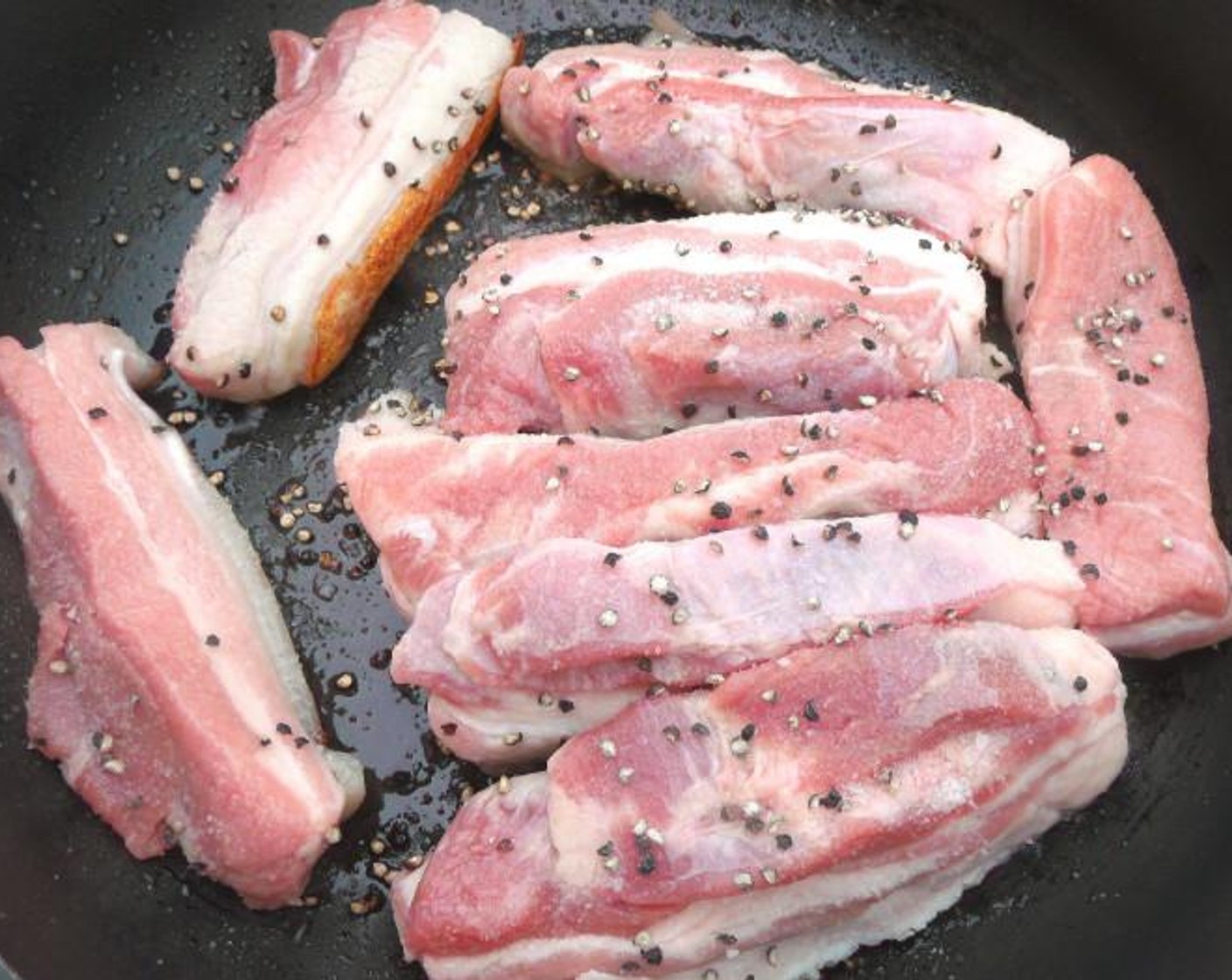 step 1 Cut Pork Belly (2 lb) into 8 thick pieces, season with Kosher Salt (to taste) and Freshly Ground Black Pepper (to taste).