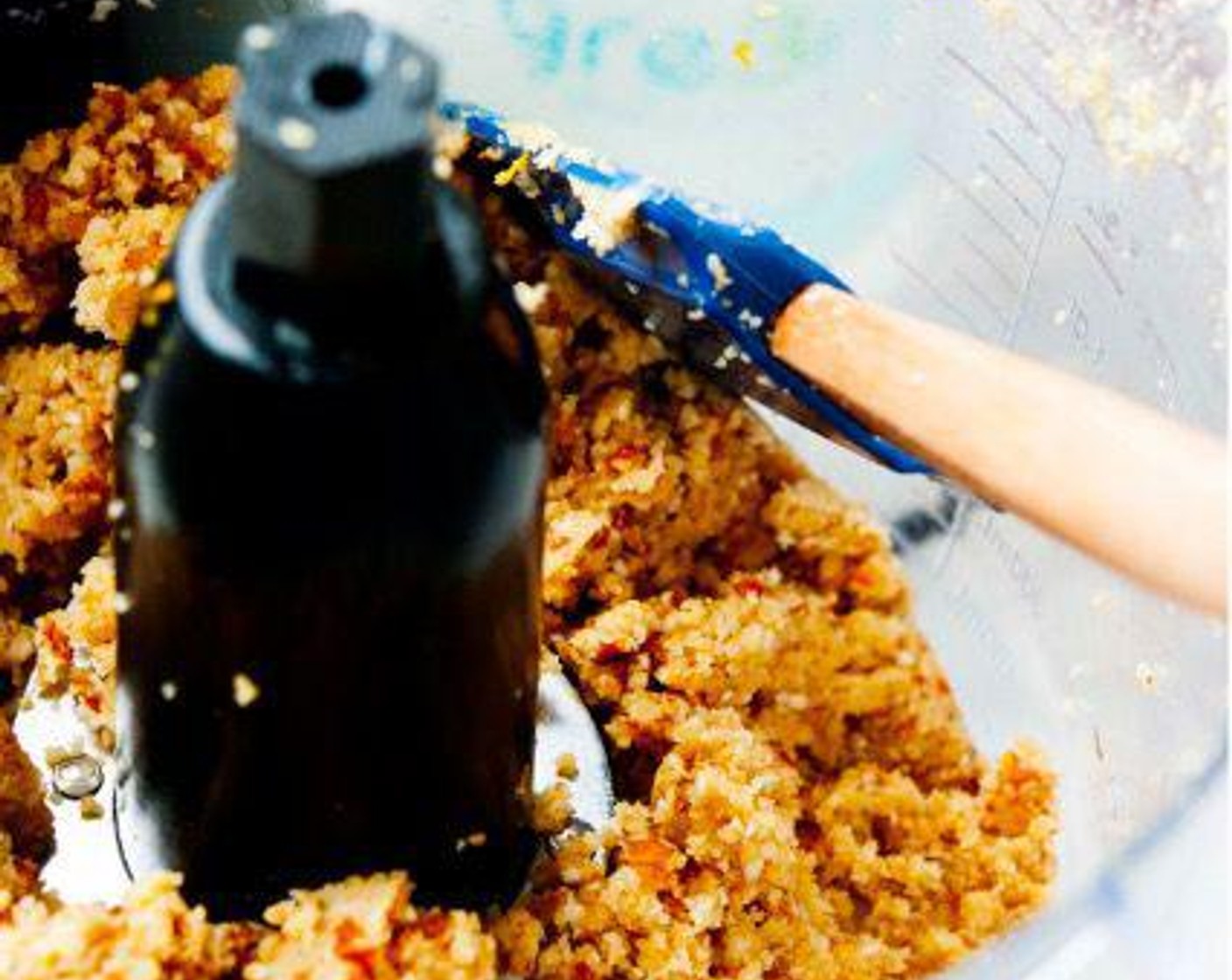 step 2 Add the Unsweetened Shredded Coconut (1/2 cup), and pulse a few more times to combine it.